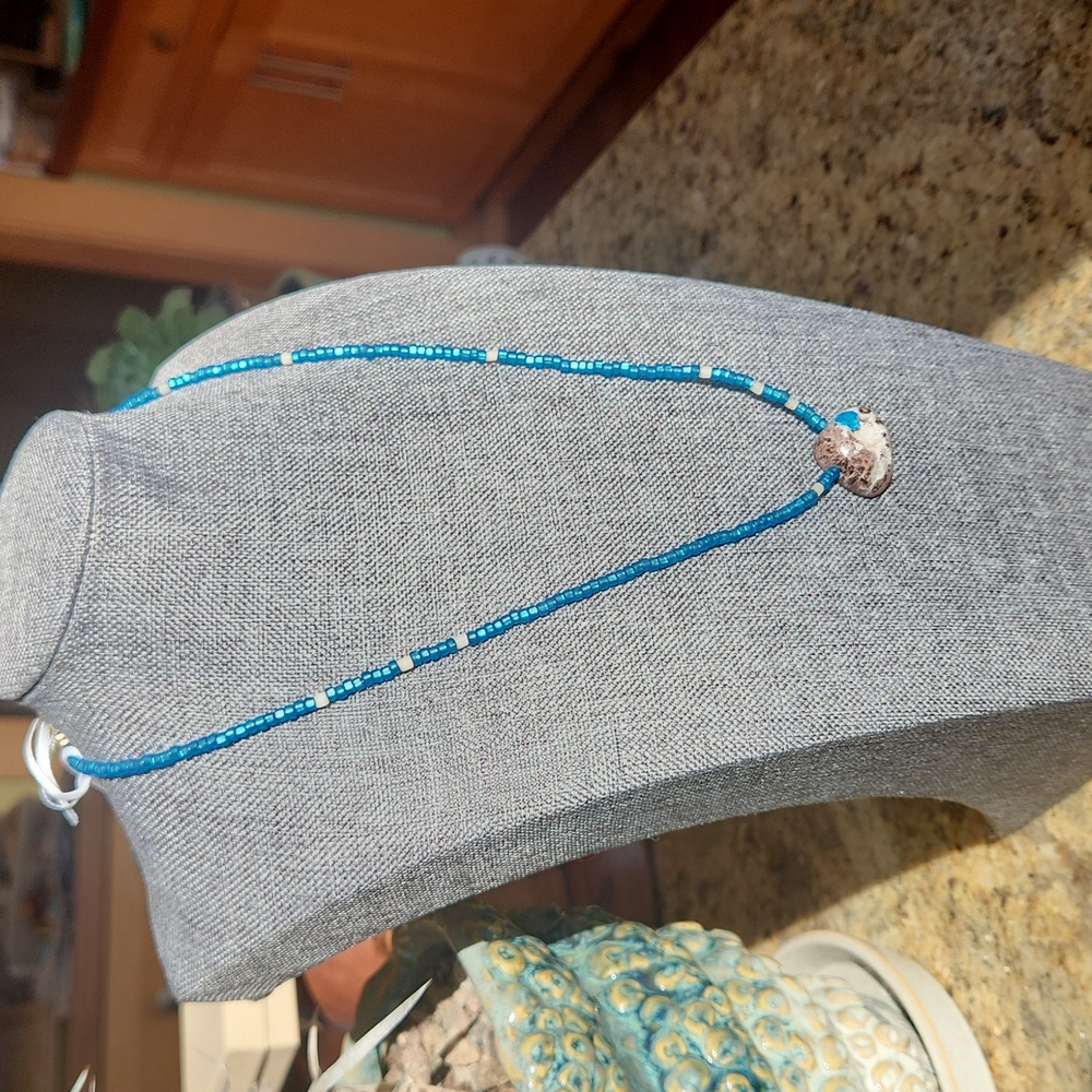 Artisan made T-shirt topper necklace with Cavensite in matrix pendant stone